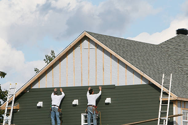 Professional Siding Replacement technician working in Tipp City, OH